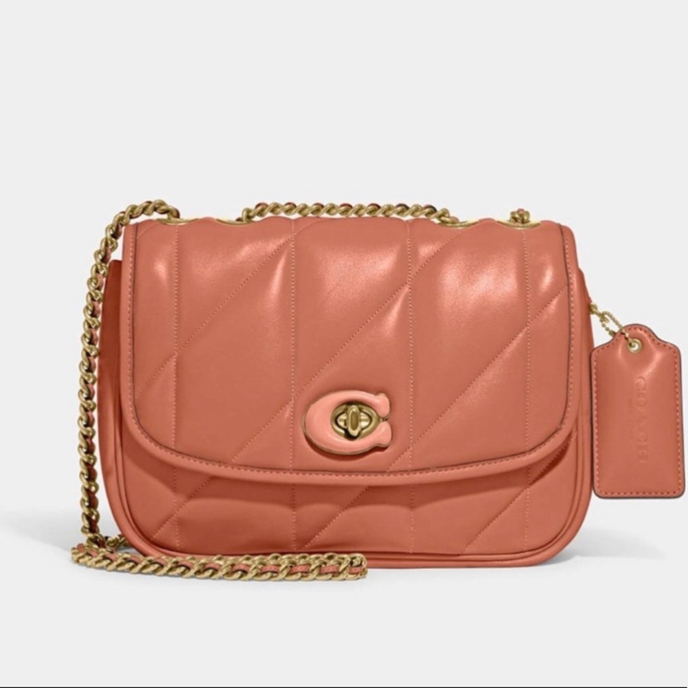 New Leather Coach Dimensions: H: 21.5cm x W: 23.5cm x D: 11cm. Strap drop: 45cm.